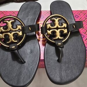 Tory Burch Black Sandals with Gold Emblem